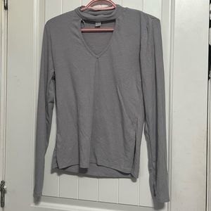 Grey long sleeve shirt with v-neck cutout